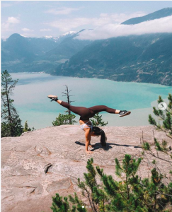 Image of girl exercising on The Chief mountaintop in Squamish